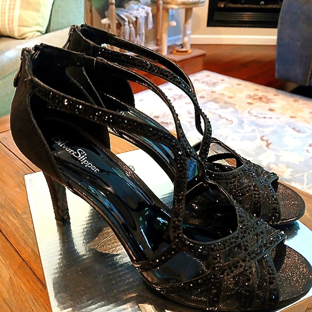 Black Glossy Heels with Intricate Cut-Out Design